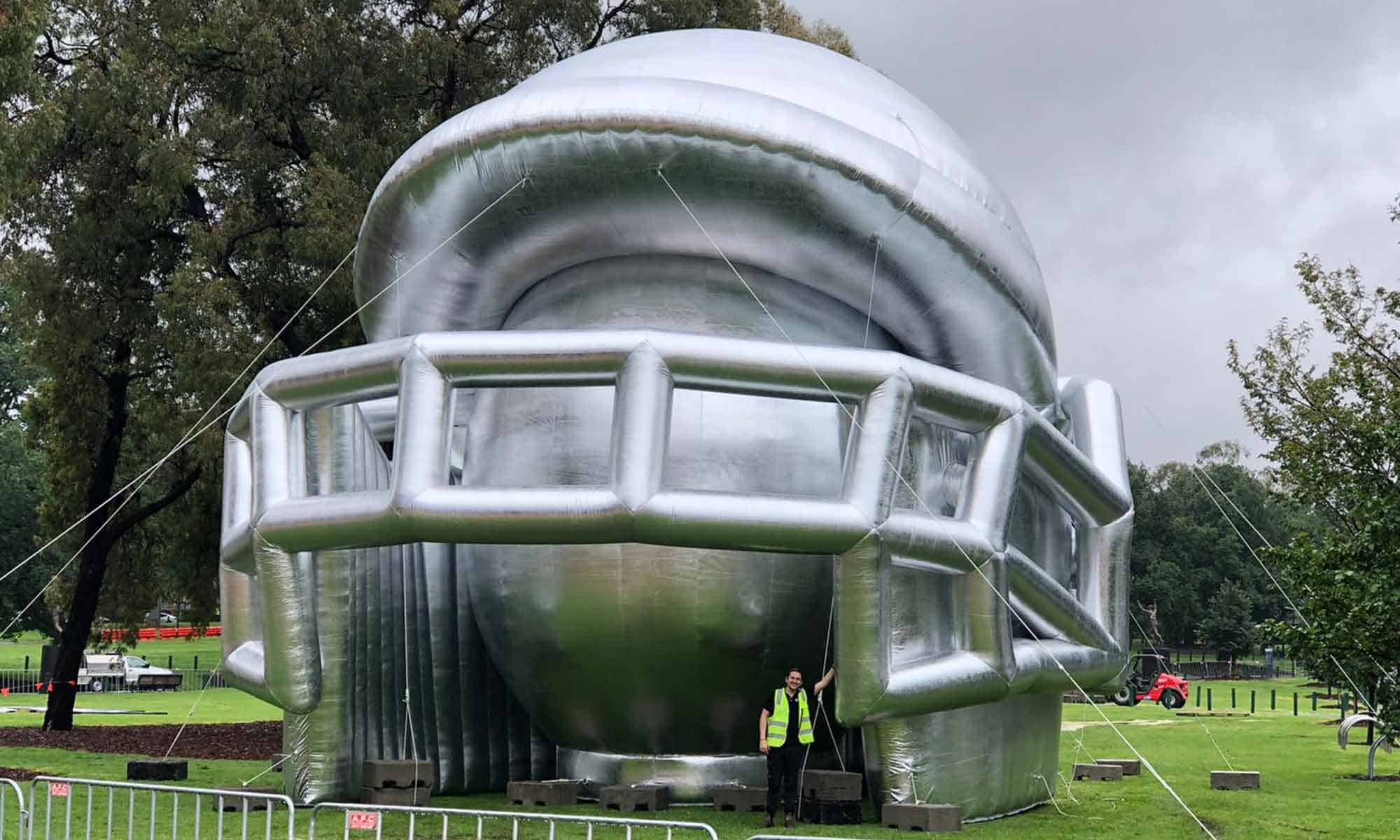 The inflatable was tall and visible enough to stand out from the surrounding area and draw the general public to the event, increasing public attendance on the park grounds.
