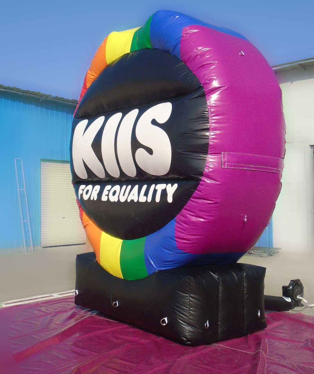 An additional unit featuring the KIIS frequency in other states and another pride-themed logo.