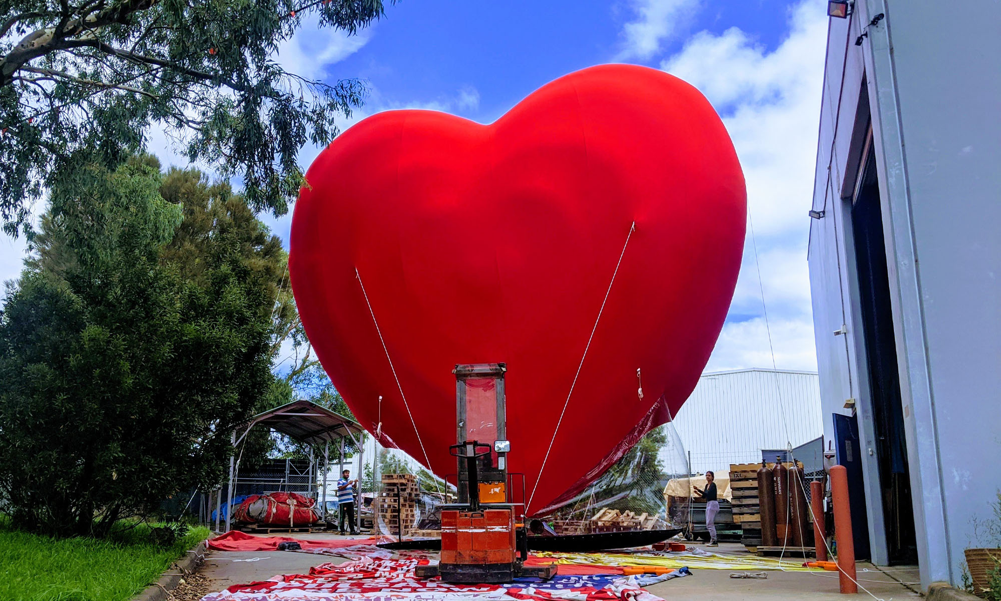 The Inflatables team created the love symbol with a matte polyester material selected for its light-absorbing properties and ability to stretch without creases.