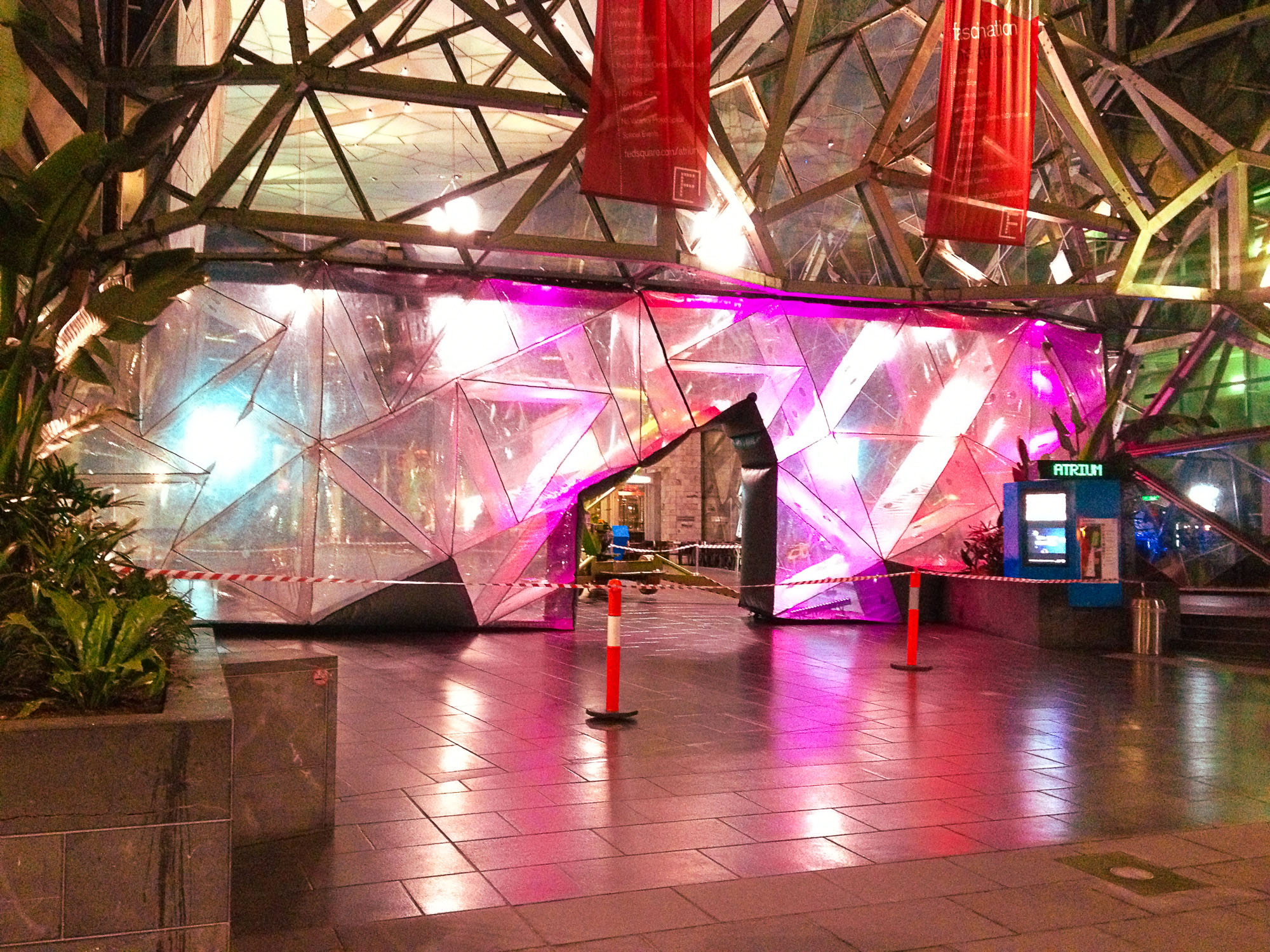 Internal lighting was added to the inflatable wall to illuminate the temporary structure at night and showcase the piece as a separate although integrated design.
