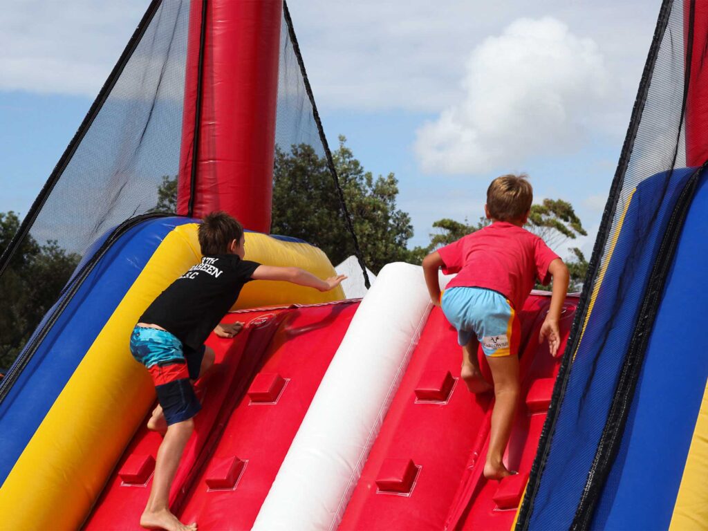 The interactive inflatable slide is immediately recognised as part of the SLS NSW organisation and presents a strong brand identity.