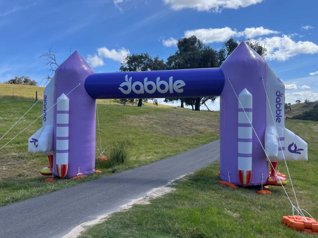 Dabble Drives Engagement at Cathedral Invitational with Custom Advertising Inflatables