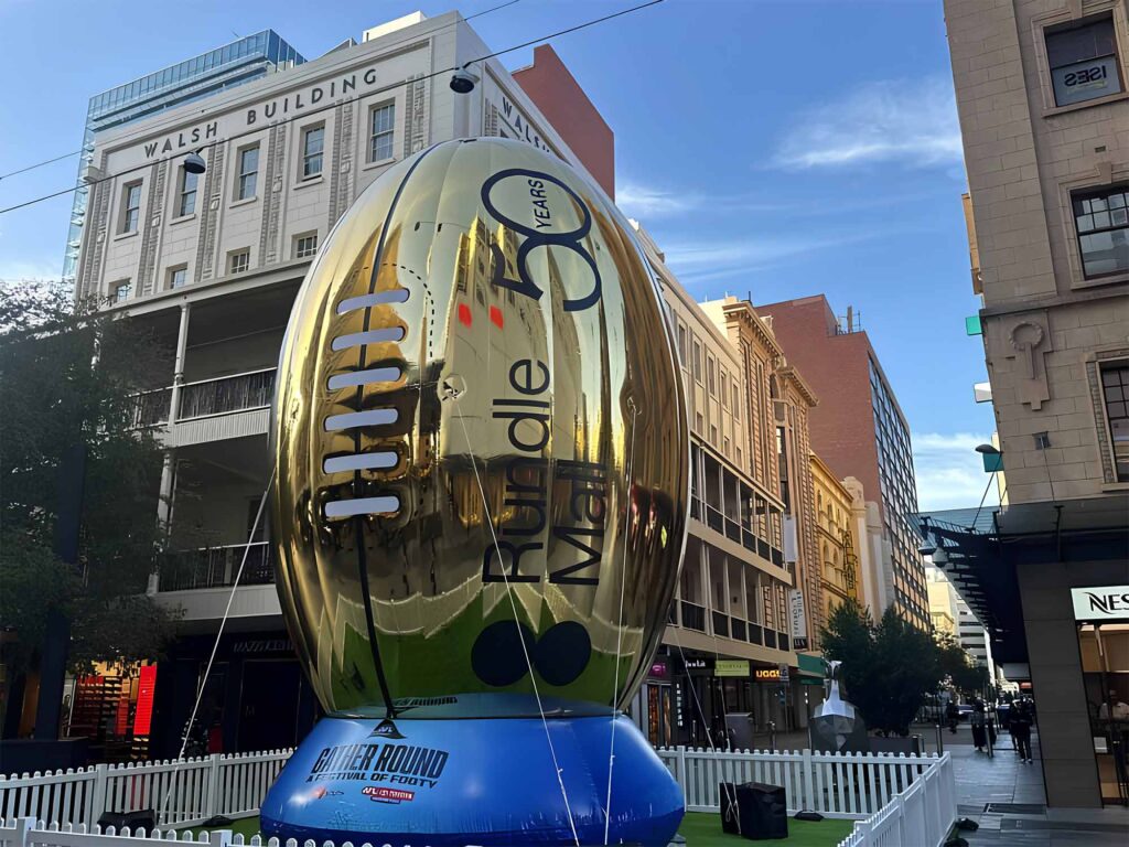 Giant Inflatables engineered a 10 m Inflatable Gold AFL Ball for the AFL League